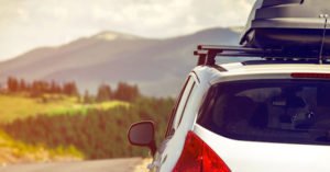 Family in their car heading out on vacation